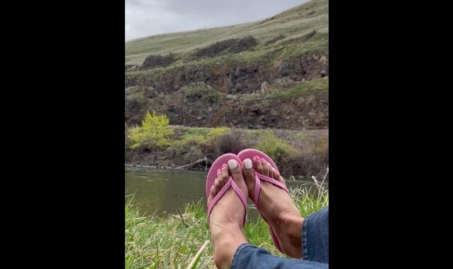 Sissyboy showing off feet in flip flops